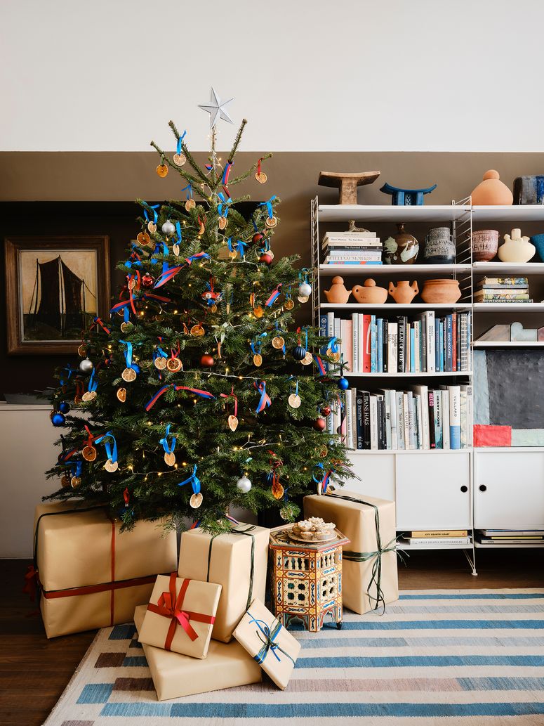 Image may contain: Home Decor, Rug, Christmas, Christmas Decorations, Festival, Art, Painting, and Christmas Tree