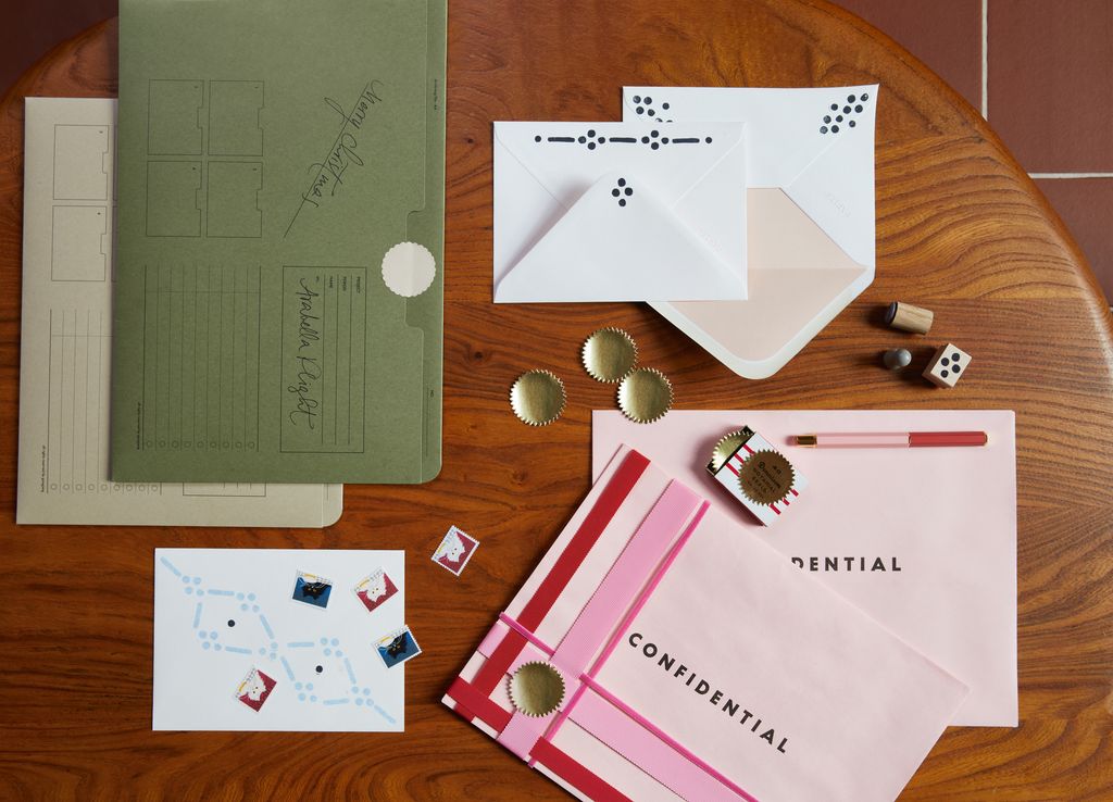 A paper gift such as a voucher can be hard to present with panache. Surplus office stationery offers fun presentation...