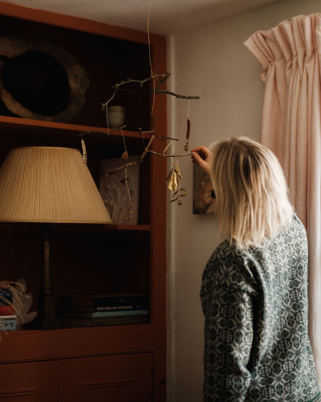 Image may contain Lamp Adult Person Blonde Hair and Head