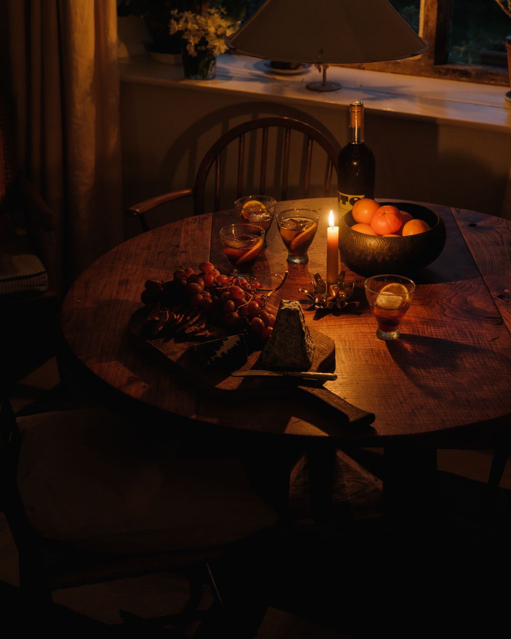 Image may contain Dining Table Furniture Table Architecture Building Dining Room Indoors Room Tabletop and Candle