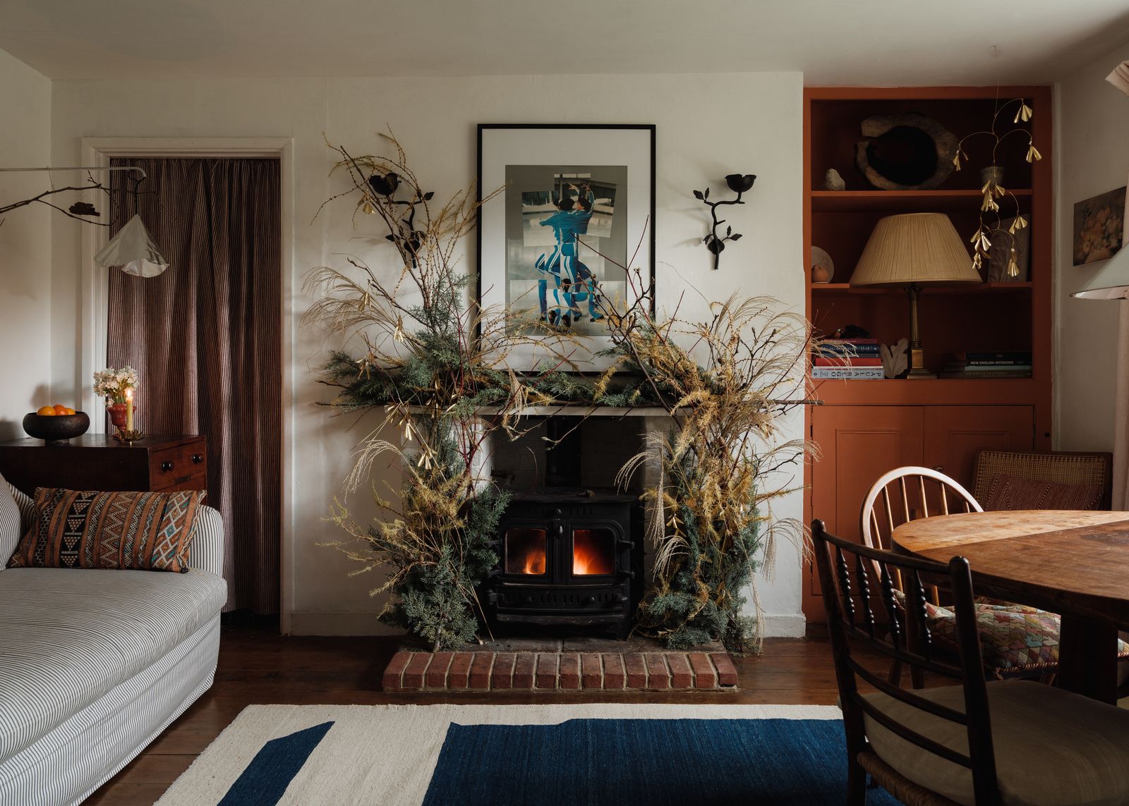 Image may contain Fireplace Indoors Hearth Adult and Person