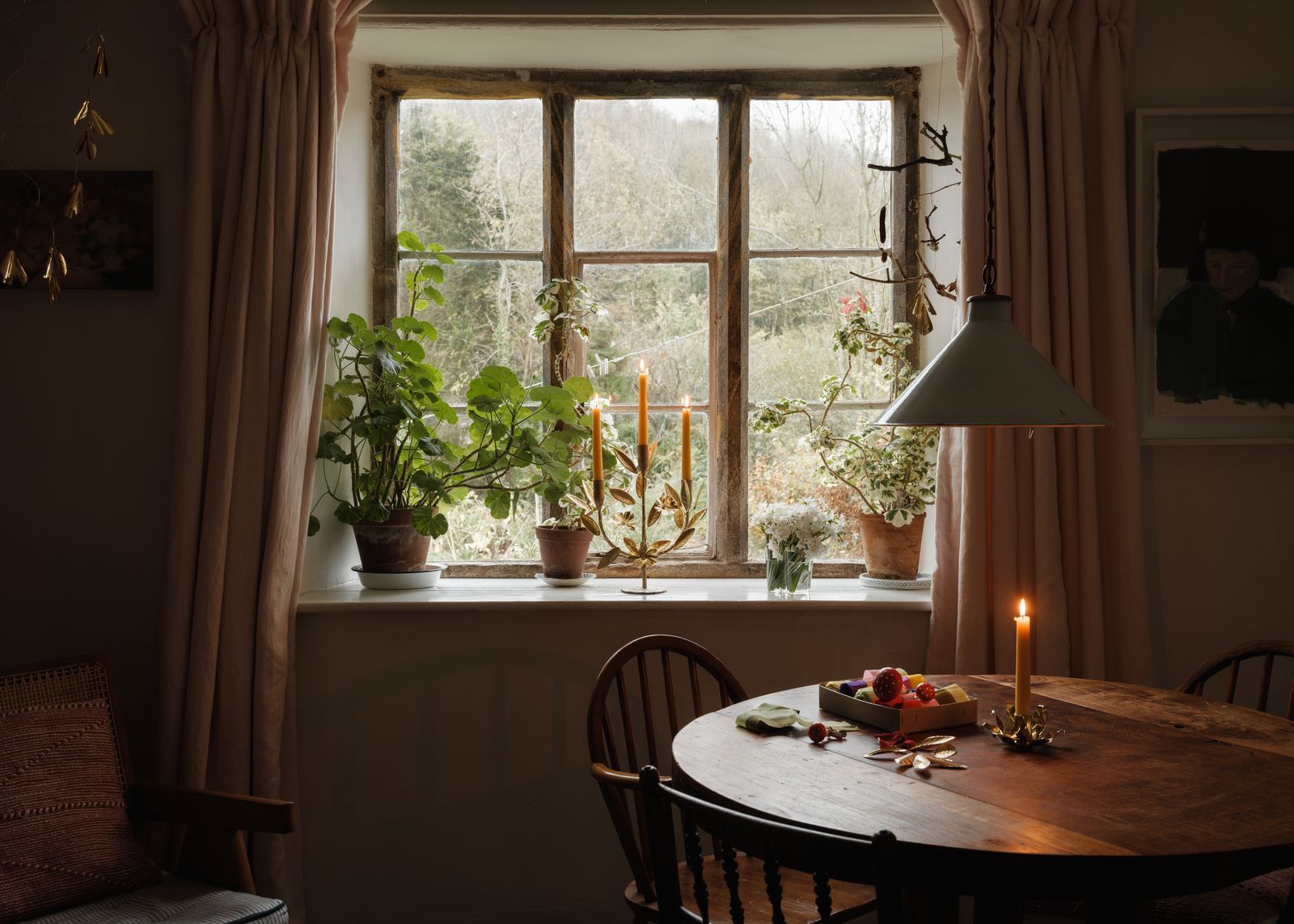 Image may contain Window Plant Windowsill Chair Furniture Candle and Bay Window
