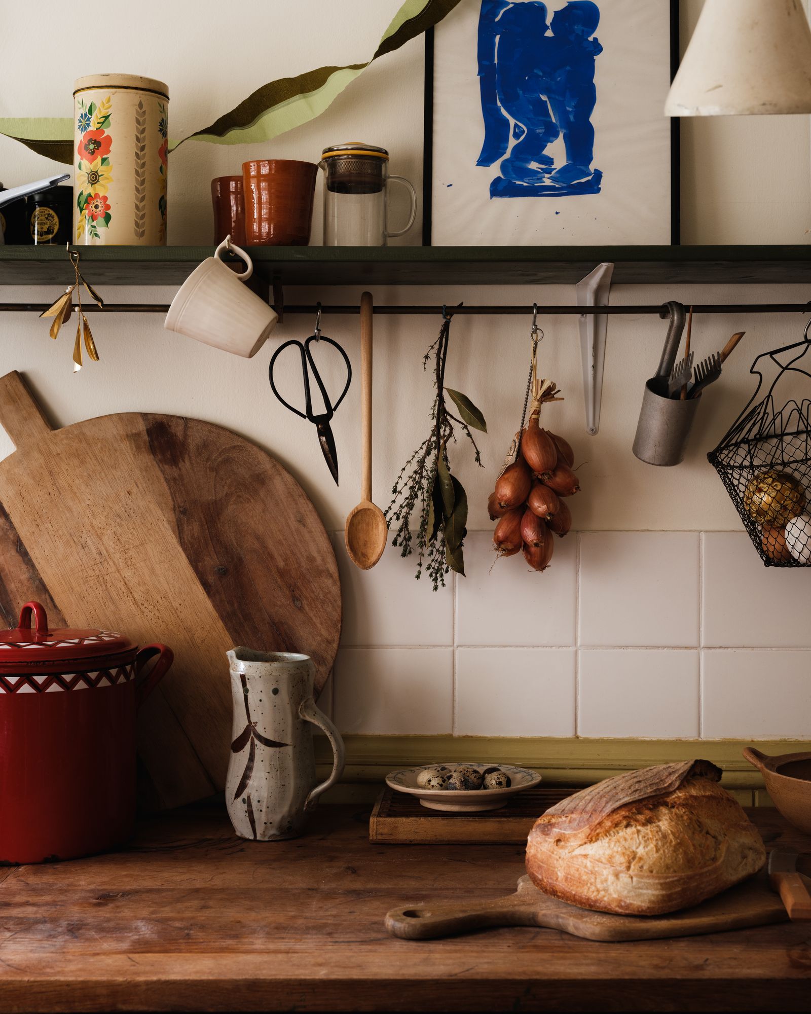 Image may contain Indoors Interior Design Scissors Cup Bread Food Hardwood Stained Wood Wood Cookware and Pot