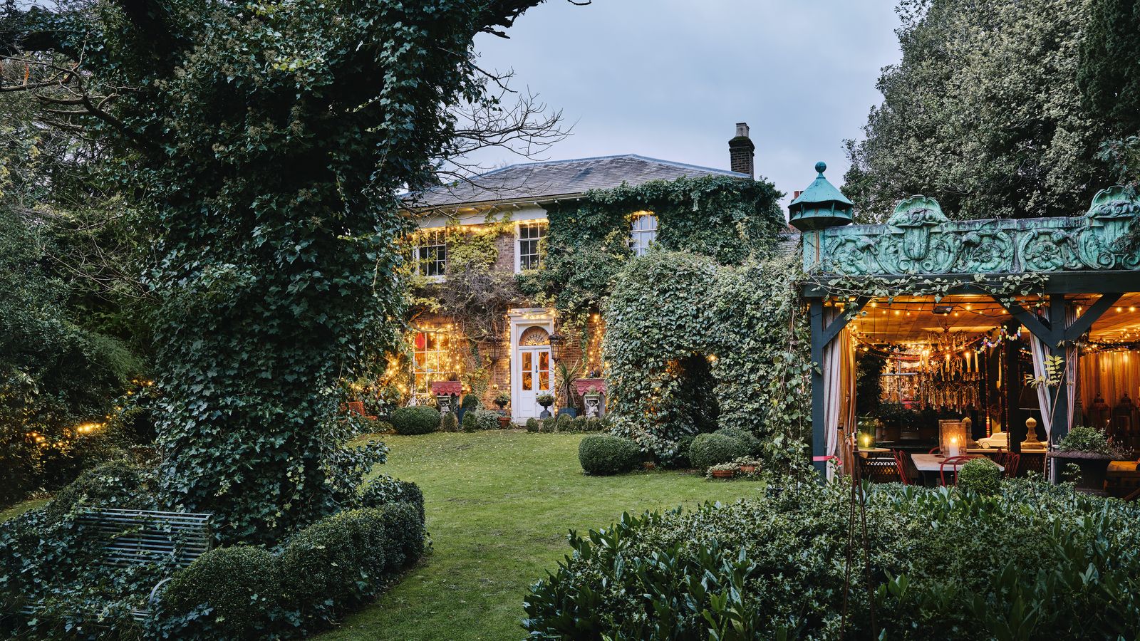 Image may contain: Architecture, Building, Cottage, House, Housing, Villa, Grass, Plant, Backyard, Nature, Outdoors, and Yard