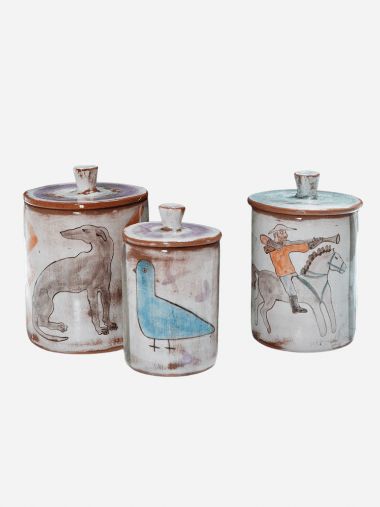 Image may contain Art Porcelain Pottery Jar Person and Tin